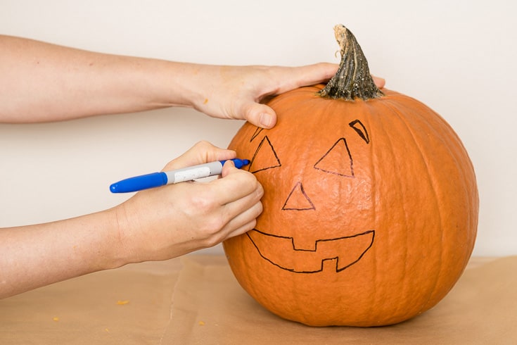 How to Carve a Pumpkin Steps: Draw Your Design - Dr. Axe
