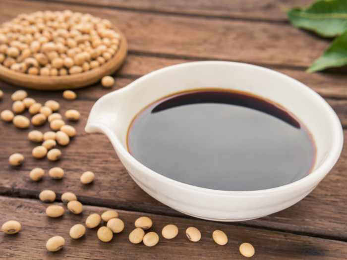 soy sauce in a bowl with soybeans