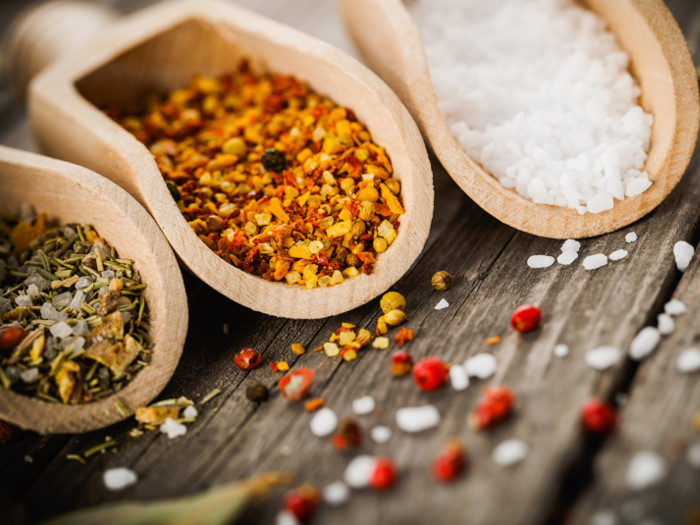 A combination of spices on spoons